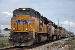 Westbound vehicle train comes out of the siding